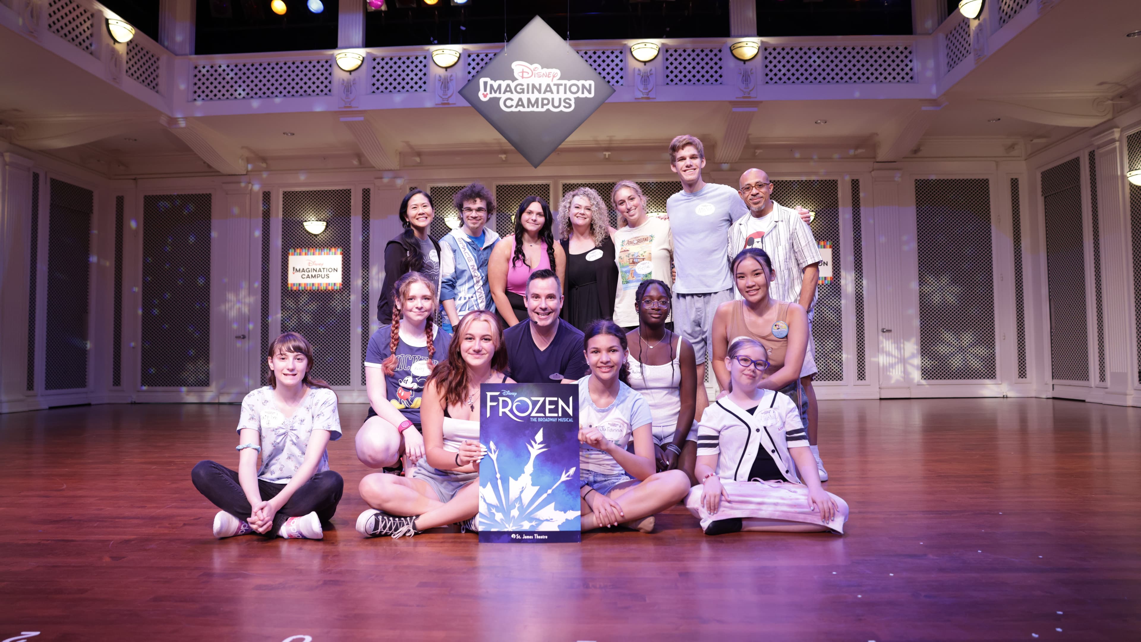 Students with Mouseketeers on stage at Disney Imagination Campus