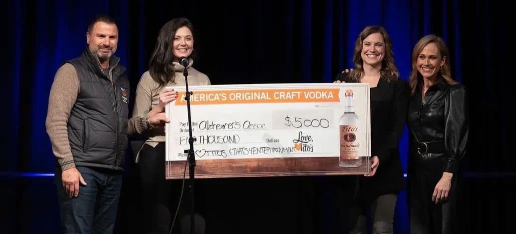 Donation moment at 90s Con featuring Tito’s