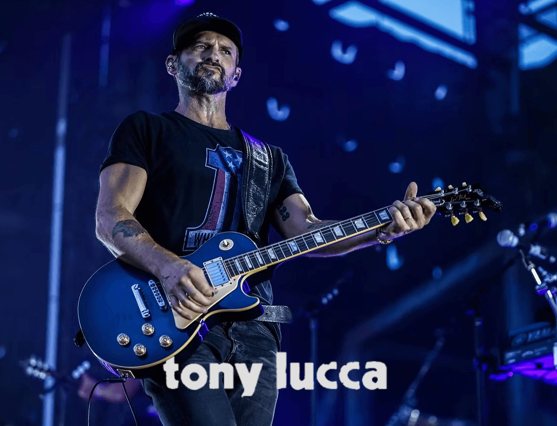 Tony Lucca performing on stage