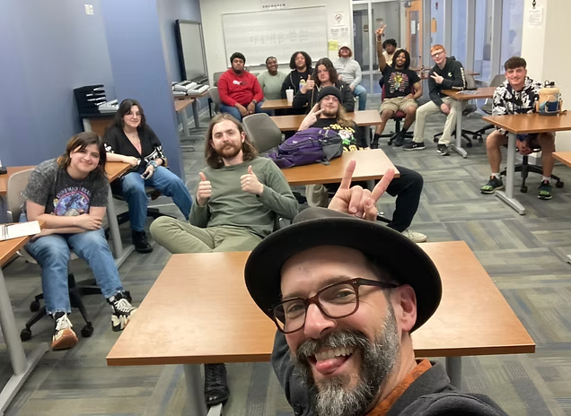 Tony Lucca with a classroom of students in an Always In The Club Foundation mentoring session