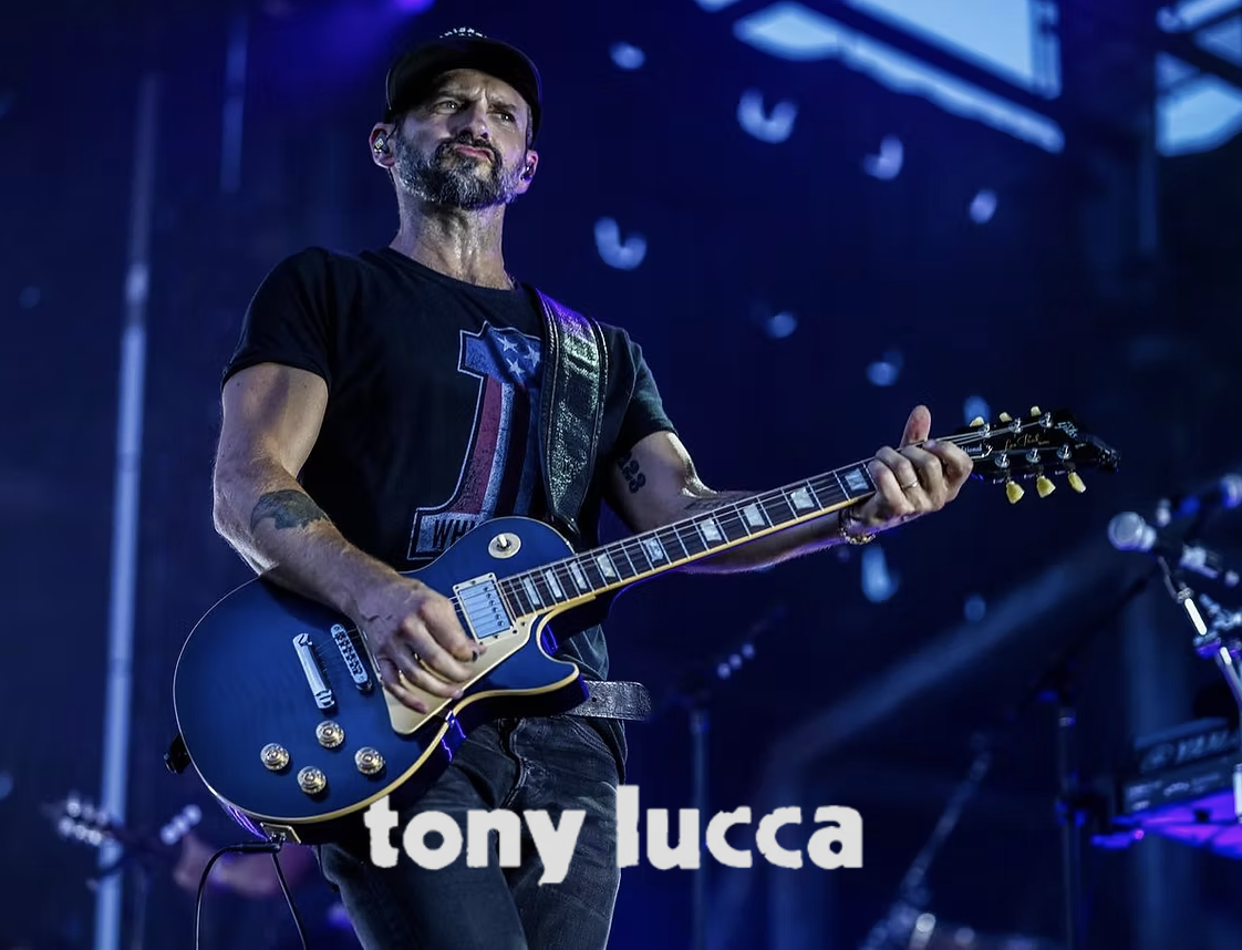 Tony Lucca performing on stage